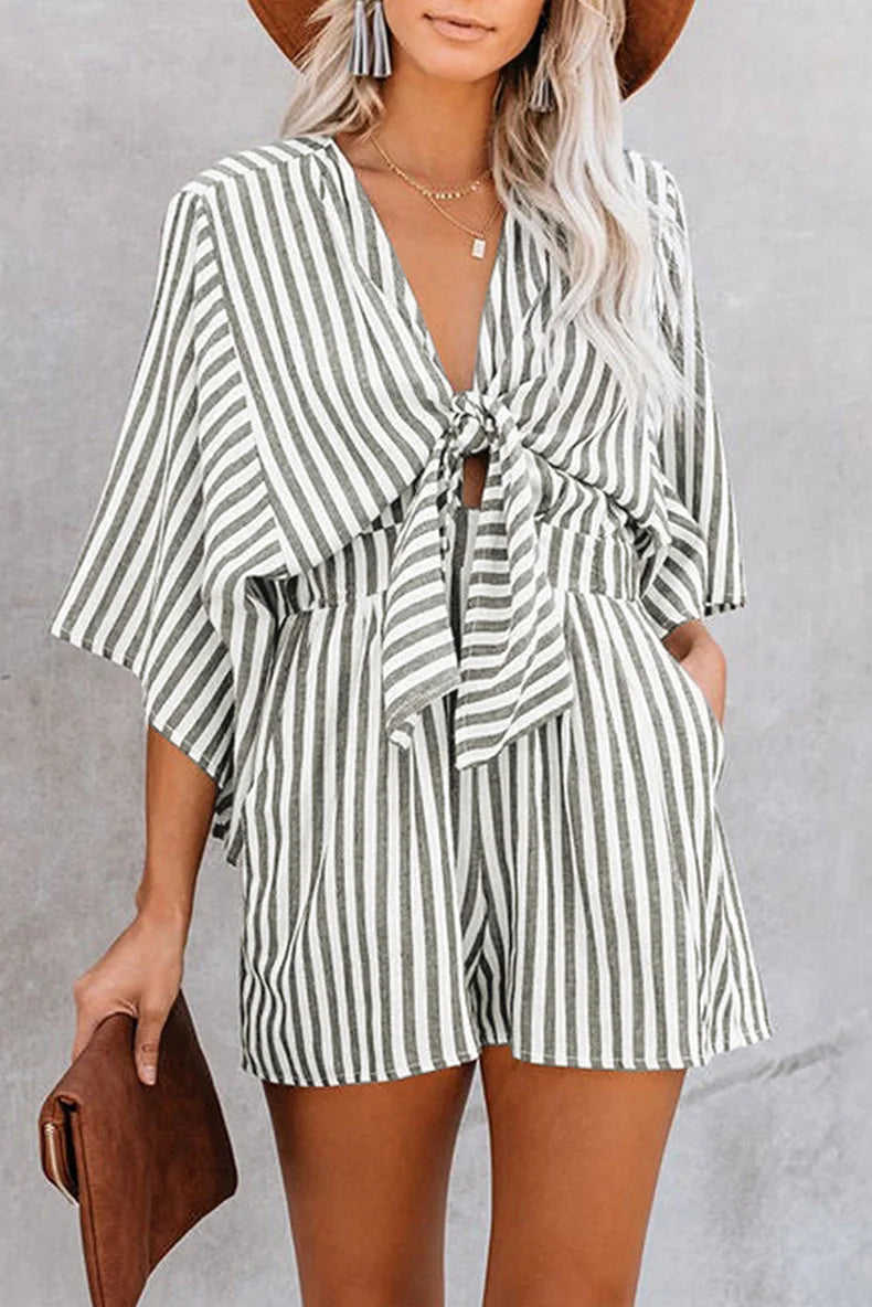 Women Striped Jumpsuit With Deep V Neck And Flared Sleeves