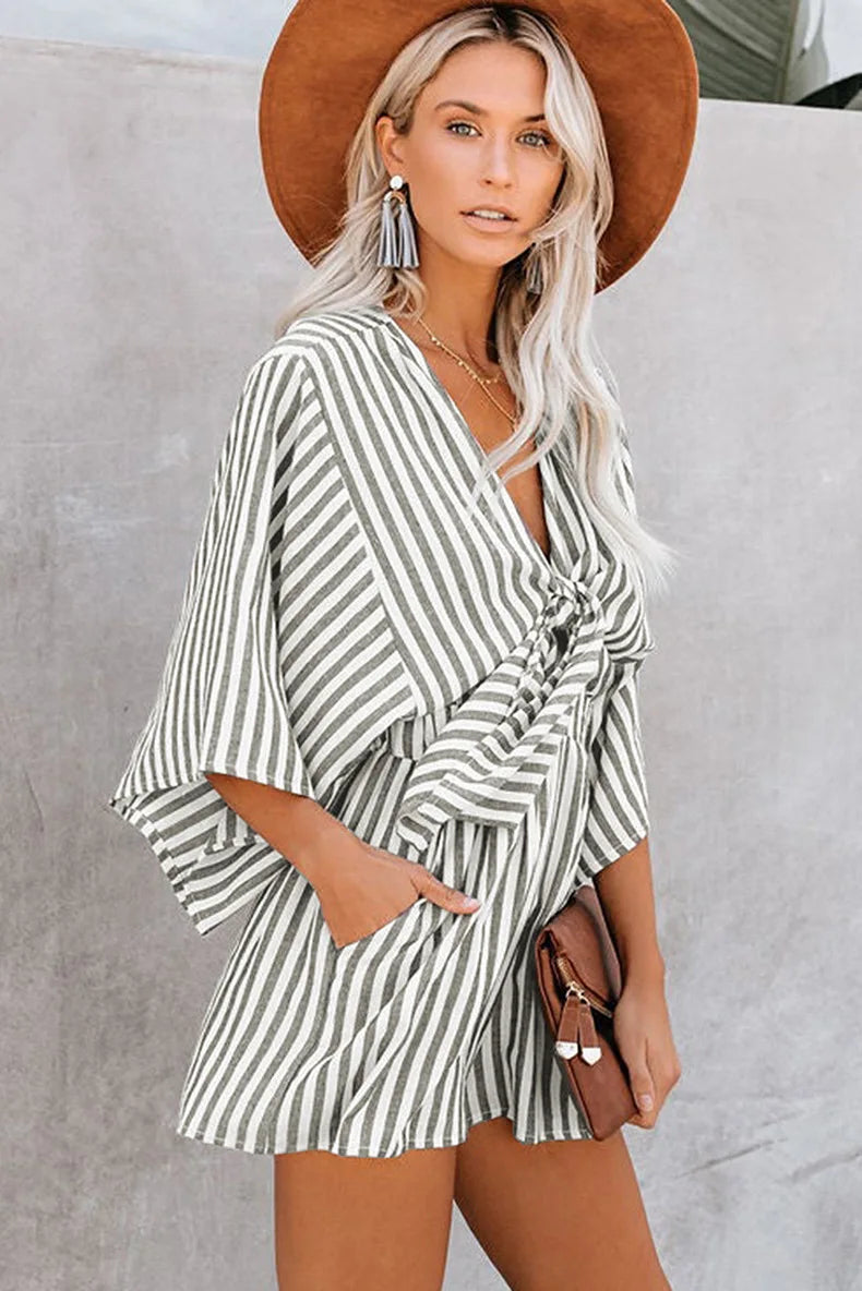 Women Striped Jumpsuit With Deep V Neck And Flared Sleeves