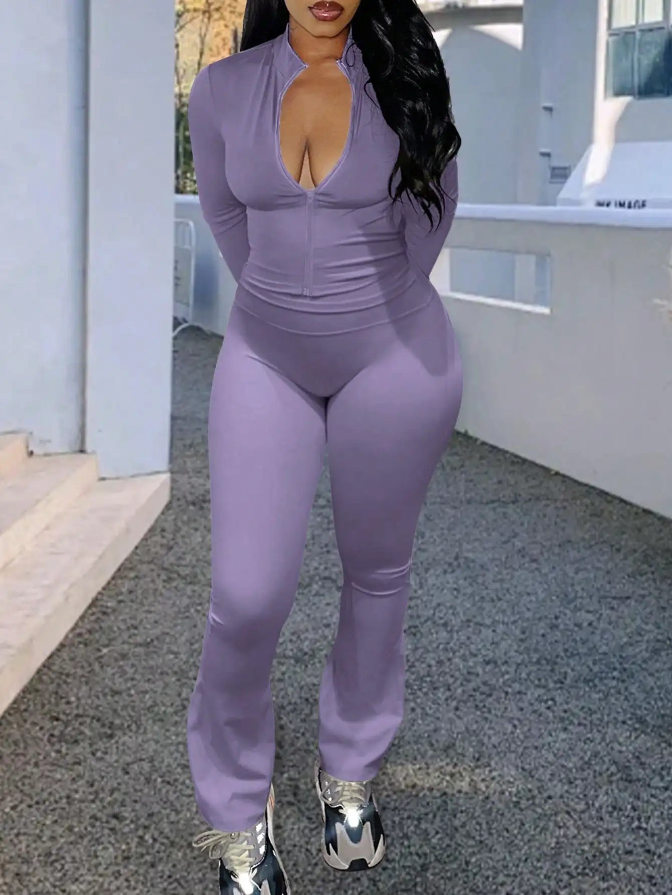 A Fashionable and Comfortable 3-piece Summer Casual Sportswear Set Featuring A Purple Sports Top and Flared Pants for Women